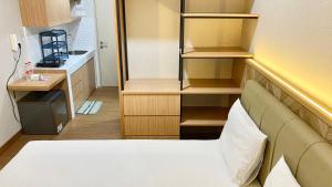 Кухня или мини-кухня в Cheapinn Tokyo Riverside PIK 2 Apartment
