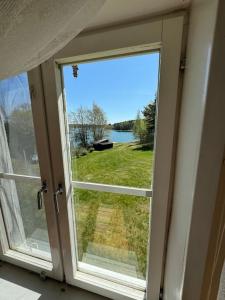 Gallery image of Majas Backe on a island with boat in Hammarland