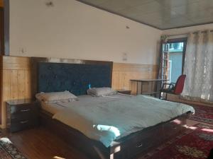 Postel nebo postele na pokoji v ubytování Julay Guest House