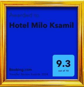 a framed picture of a hotel mirimo kishi at Hotel Milo Ksamil in Ksamil