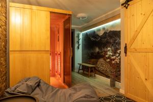 Posteľ alebo postele v izbe v ubytovaní Biathlon Park - Apartament VIP