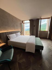 Postel nebo postele na pokoji v ubytování Parc Hotel San Pietro + 30 fotografií
