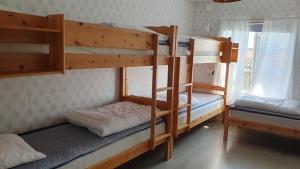 Postel nebo postele na pokoji v ubytování Vandrarhemmet Gammelgården + 25 fotografií