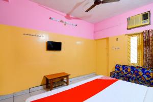 Μια τηλεόραση ή/και κέντρο ψυχαγωγίας στο OYO Hotel Bhaba Lakshmi