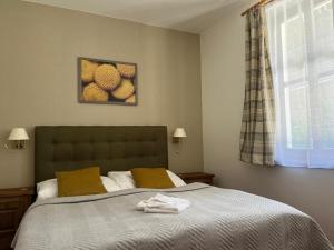 Letto o letti in una camera di Wellness Pension 7