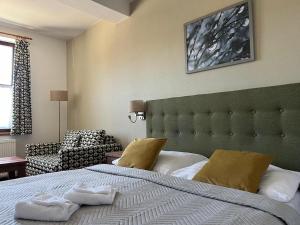 Letto o letti in una camera di Wellness Pension 7