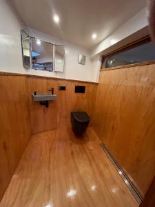 a bathroom with a toilet and a sink at Casey's Lake View House Boat in Amsterdam +31 photos