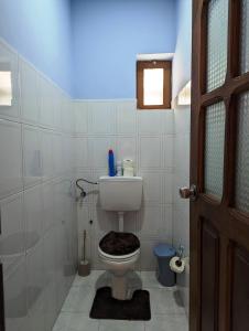 a bathroom with a toilet and a sink at Apartment Funana Tarrafal in Tarrafal +18 photos