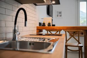 a kitchen with a sink and a counter at ASTRA in Parga +155 photos