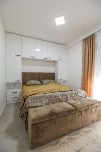 Postel nebo postele na pokoji v ubytování Apartman Jelena