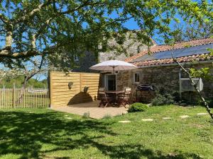 Κήπος έξω από το le Domaine du Petit Bois, Gîte l'Etable