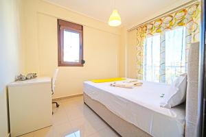 Posteľ alebo postele v izbe v ubytovaní LUXURY AND SUNNY APARTMENT 250 mts FROM THE BEACH!!