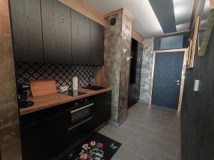 Kuchyňa alebo kuchynka v ubytovaní Romantisches Bergapartment - Luxus Studio auf der Simonhöhe
