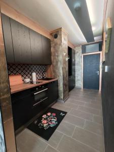 Kuchyňa alebo kuchynka v ubytovaní Romantisches Bergapartment - Luxus Studio auf der Simonhöhe