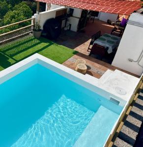 Bazén v ubytování Garancor nebo v jeho okolí