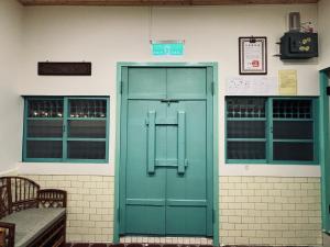 Fotografija v galeriji nastanitve 家暖暖,老屋新生,房源內有戶外空間,嘉義市民宿013號 v mestu Chiayi