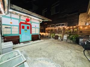 Fotografija v galeriji nastanitve 家暖暖,老屋新生,房源內有戶外空間,嘉義市民宿013號 v mestu Chiayi