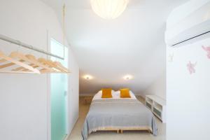 Posteľ alebo postele v izbe v ubytovaní LOFT2STAY.COM