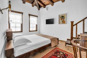 Voodi või voodid majutusasutuse Hotel Bohem Berat toas