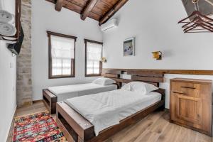 Voodi või voodid majutusasutuse Hotel Bohem Berat toas