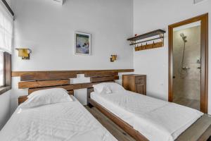 Voodi või voodid majutusasutuse Hotel Bohem Berat toas