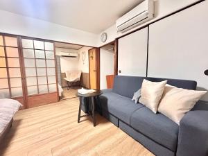 Ruang duduk di 天下茶屋駅5分、専用庭付き平屋—KIK Iハウス