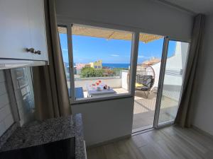 Balkón nebo terasa v ubytování SUNNY DAY Deluxe 1