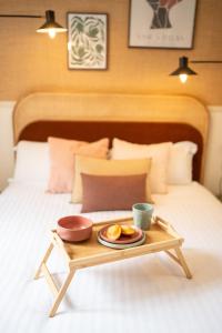 Ένα ή περισσότερα κρεβάτια σε δωμάτιο στο Villa Vichéia - Appartement 14