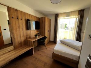 Postel nebo postele na pokoji v ubytování Garni-Hotel mir.es