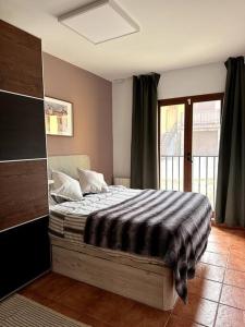 En eller flere senge i et værelse på Priver cinema at home