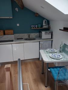 Η κουζίνα ή μικρή κουζίνα στο Charmante Tiny House