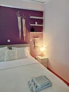 Ένα ή περισσότερα κρεβάτια σε δωμάτιο στο Dani's boho home