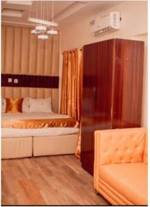 Postel nebo postele na pokoji v ubytování HOTEL D RITZ