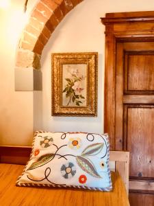 Postel nebo postele na pokoji v ubytování Agriturismo La Palazzina