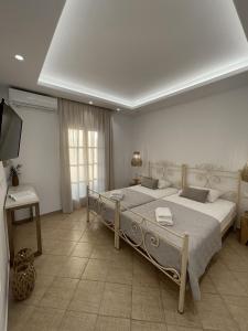 En eller flere senger på et rom på Mare Monte Studios Naxos