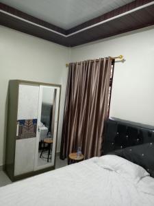 Postel nebo postele na pokoji v ubytování Talpe villa