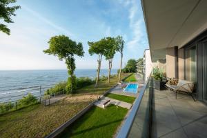 Gambar di galeri bagi Apartament z widokiem na morze Hevenia di Rewal