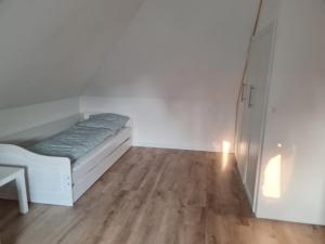Ein Bett oder Betten in einem Zimmer der Unterkunft Treeneperle