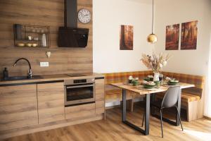 Kuchyň nebo kuchyňský kout v ubytování Nora Apartments