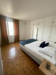 Posteľ alebo postele v izbe v ubytovaní magnifique appartement