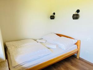 Posteľ alebo postele v izbe v ubytovaní Bałtyk Park Gąski