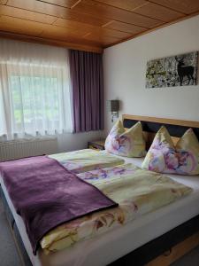 Posteľ alebo postele v izbe v ubytovaní Ferienwohnung Zuppinger + 37 fotografií