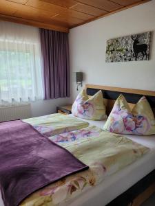 Posteľ alebo postele v izbe v ubytovaní Ferienwohnung Zuppinger