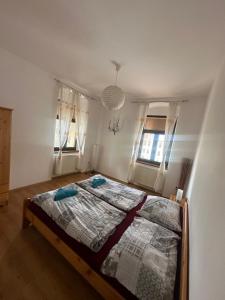 Postel nebo postele na pokoji v ubytování Apartmán na horách
