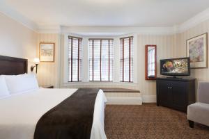 Cama o camas de una habitación en Executive Hotel Vintage Court