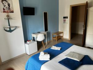 Postel nebo postele na pokoji v ubytování Appartamento AmareTrani