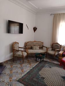 Χώρος καθιστικού στο Magnifique petite villa a 1 min de la plage