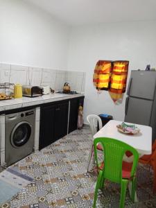 Η κουζίνα ή μικρή κουζίνα στο Magnifique petite villa a 1 min de la plage