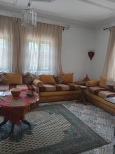 Χώρος καθιστικού στο Magnifique petite villa a 1 min de la plage