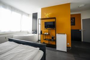 Rúm í herbergi á Berger Zentrum
